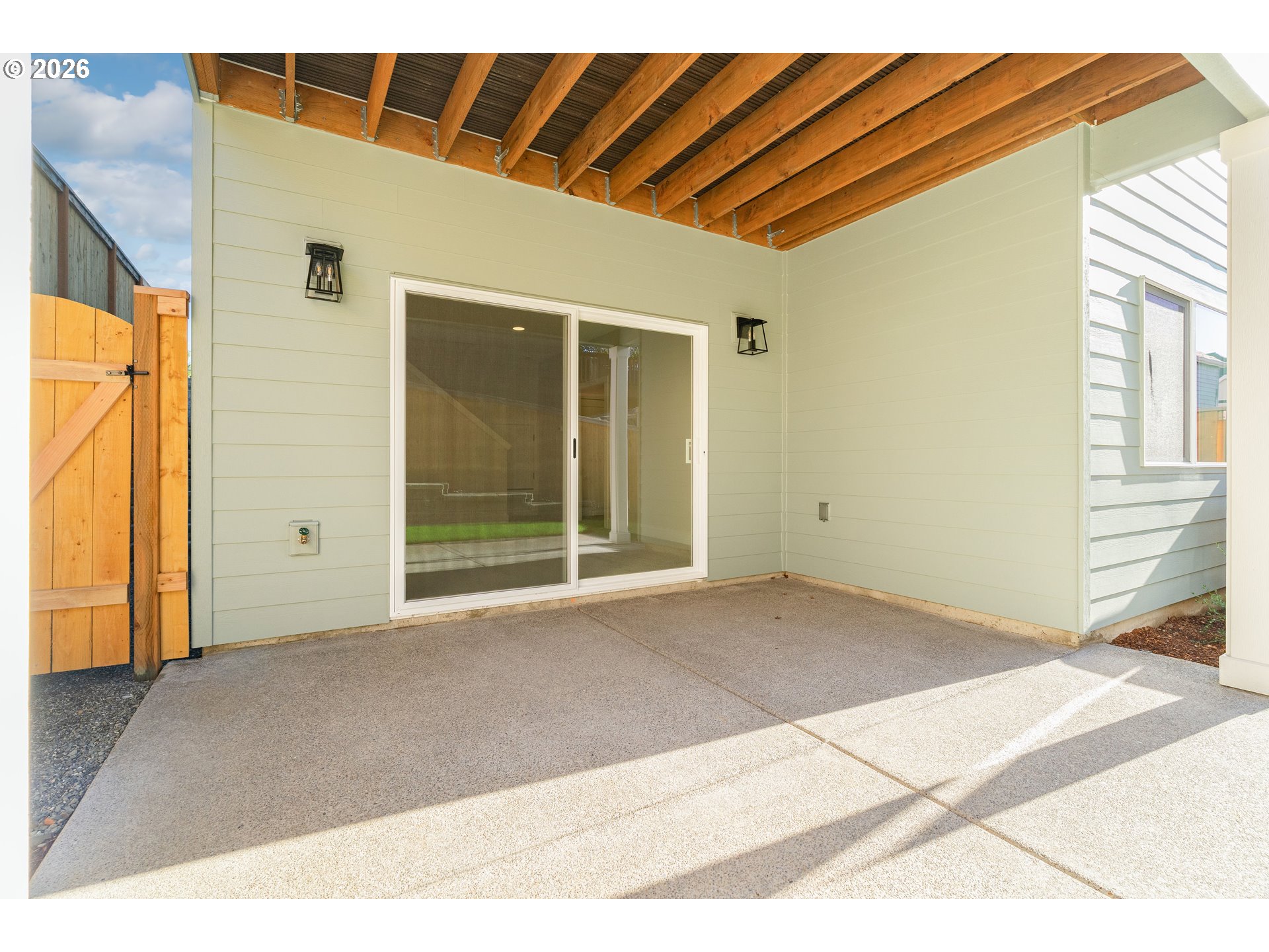 2947 Northwest 114th Terrace Portland, OR 97229 - Photo 42 of 46 a view of an empty room with wooden floor and a window