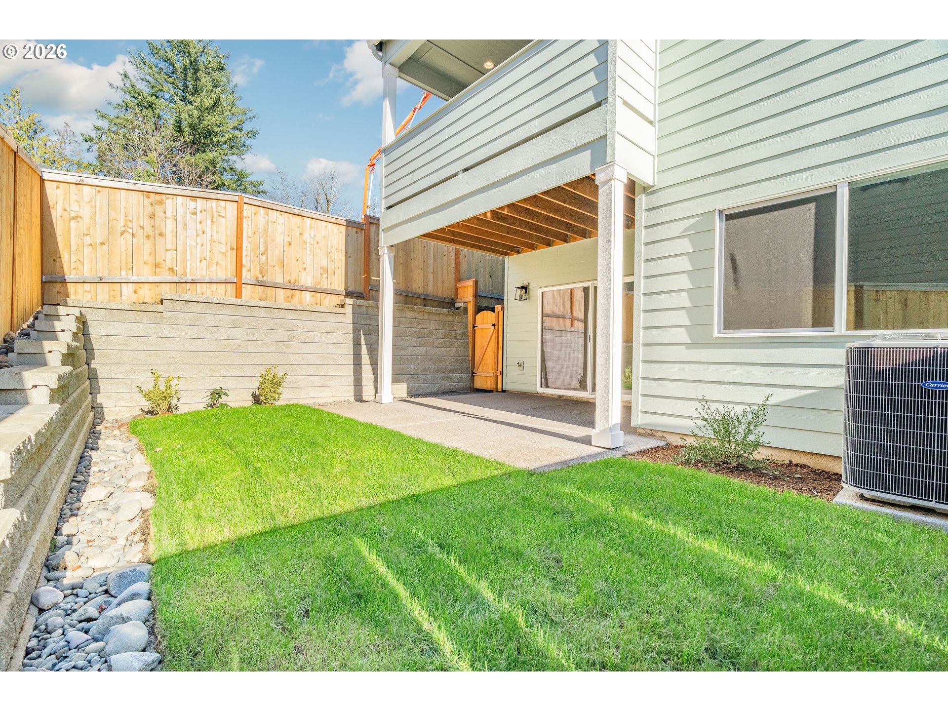2947 Northwest 114th Terrace Portland, OR 97229 - Photo 43 of 46 a view of a backyard with plants and a patio