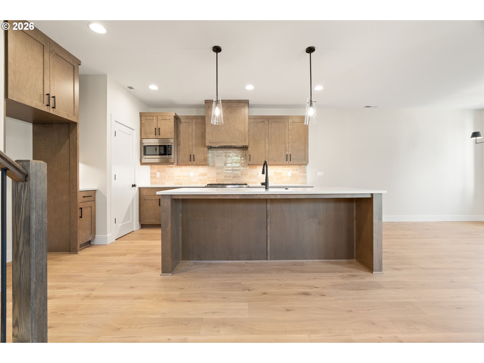 2947 Northwest 114th Terrace Portland, OR 97229 - Photo 8 of 46 a kitchen with stainless steel appliances granite countertop a sink a stove and a refrigerator