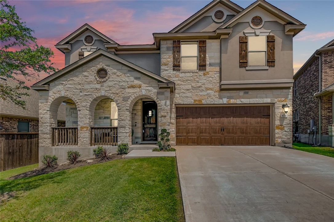 1732 Bovina Drive Leander, TX 78641 - Photo 1 of 1 a view of a brick house with a large windows