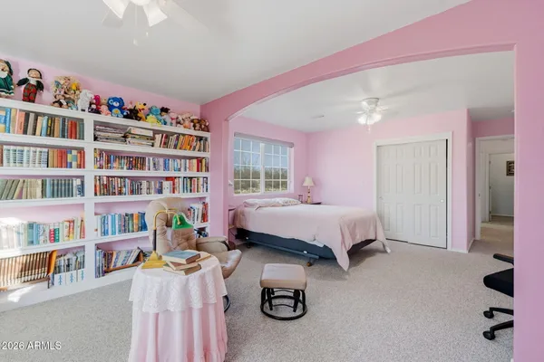 a bathroom with a sink toilet and mirror