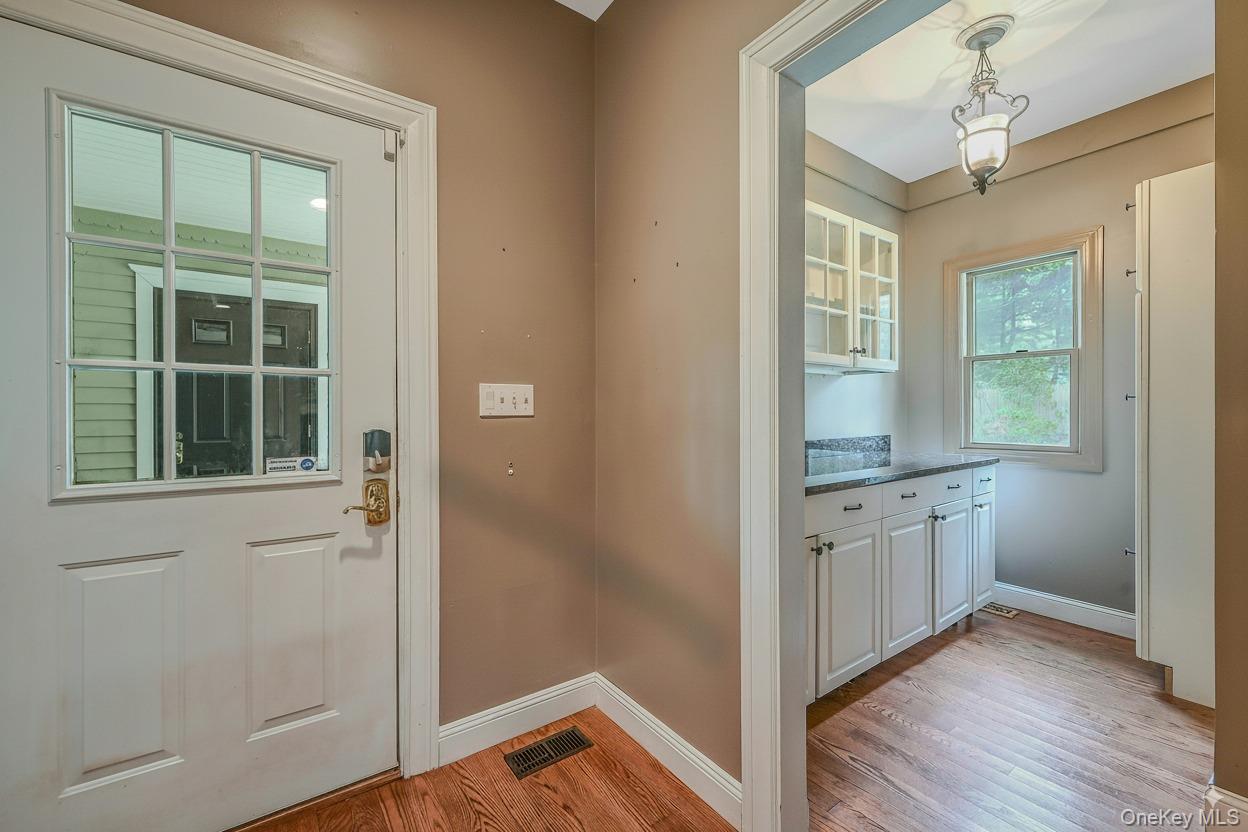 4 Skunk Hollow Road Huntington, NY 11743 - Photo 11 of 35 a view of a kitchen from the hallway