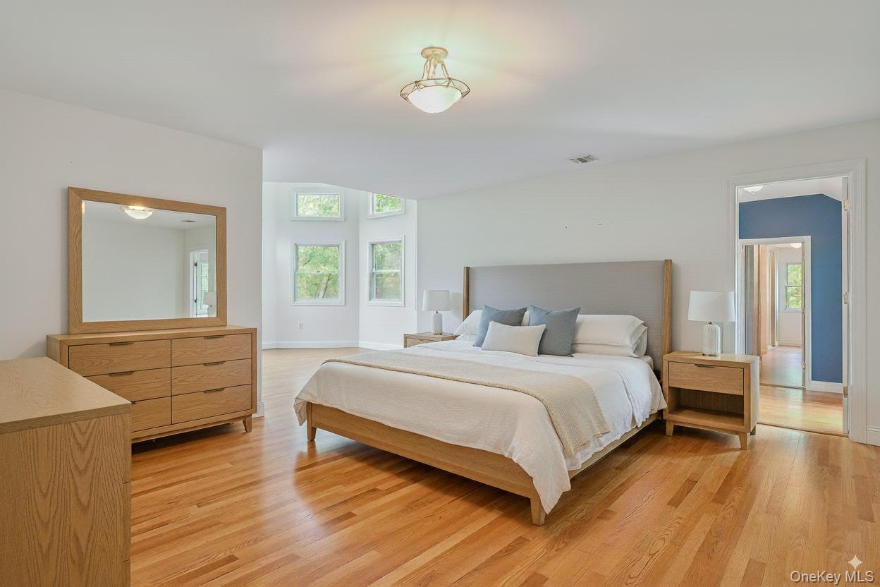 4 Skunk Hollow Road Huntington, NY 11743 - Photo 14 of 35 a bedroom with a bed and window