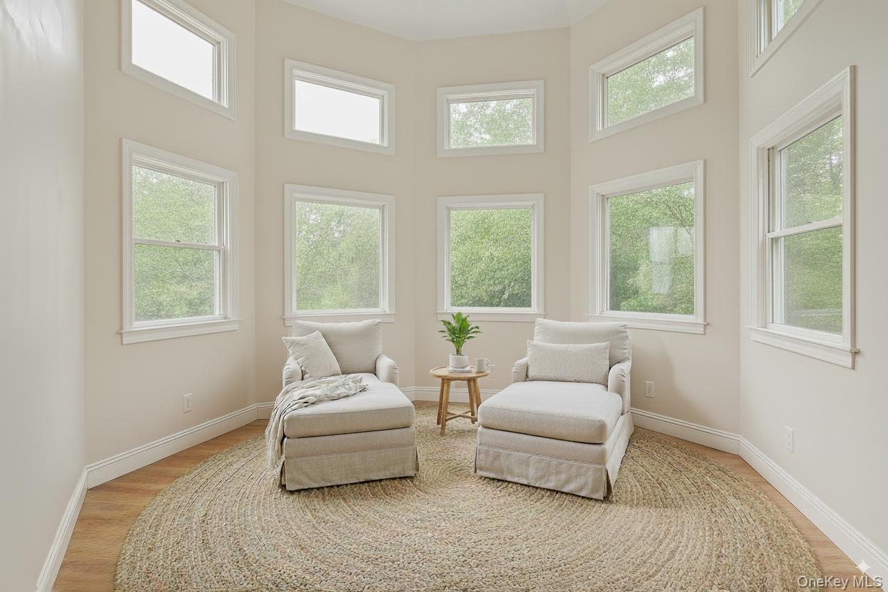 4 Skunk Hollow Road Huntington, NY 11743 - Photo 16 of 35 a living room with furniture and windows