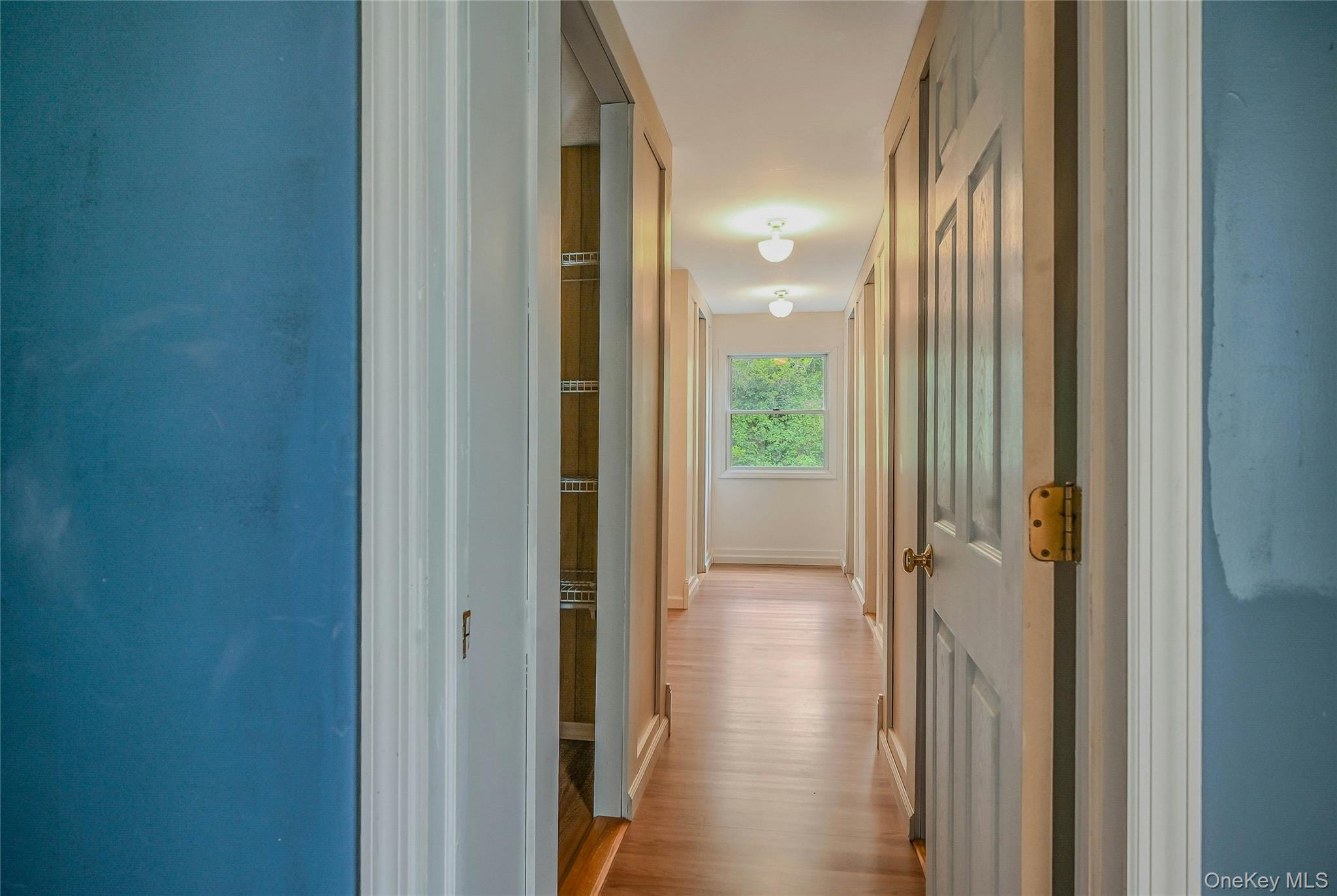 4 Skunk Hollow Road Huntington, NY 11743 - Photo 20 of 35 a view of a bathroom from a hallway