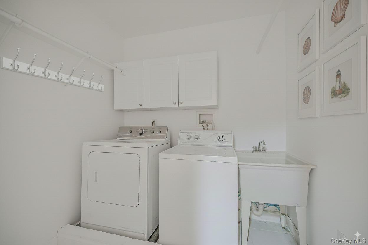 4 Skunk Hollow Road Huntington, NY 11743 - Photo 23 of 35 a utility room with dryer and washer