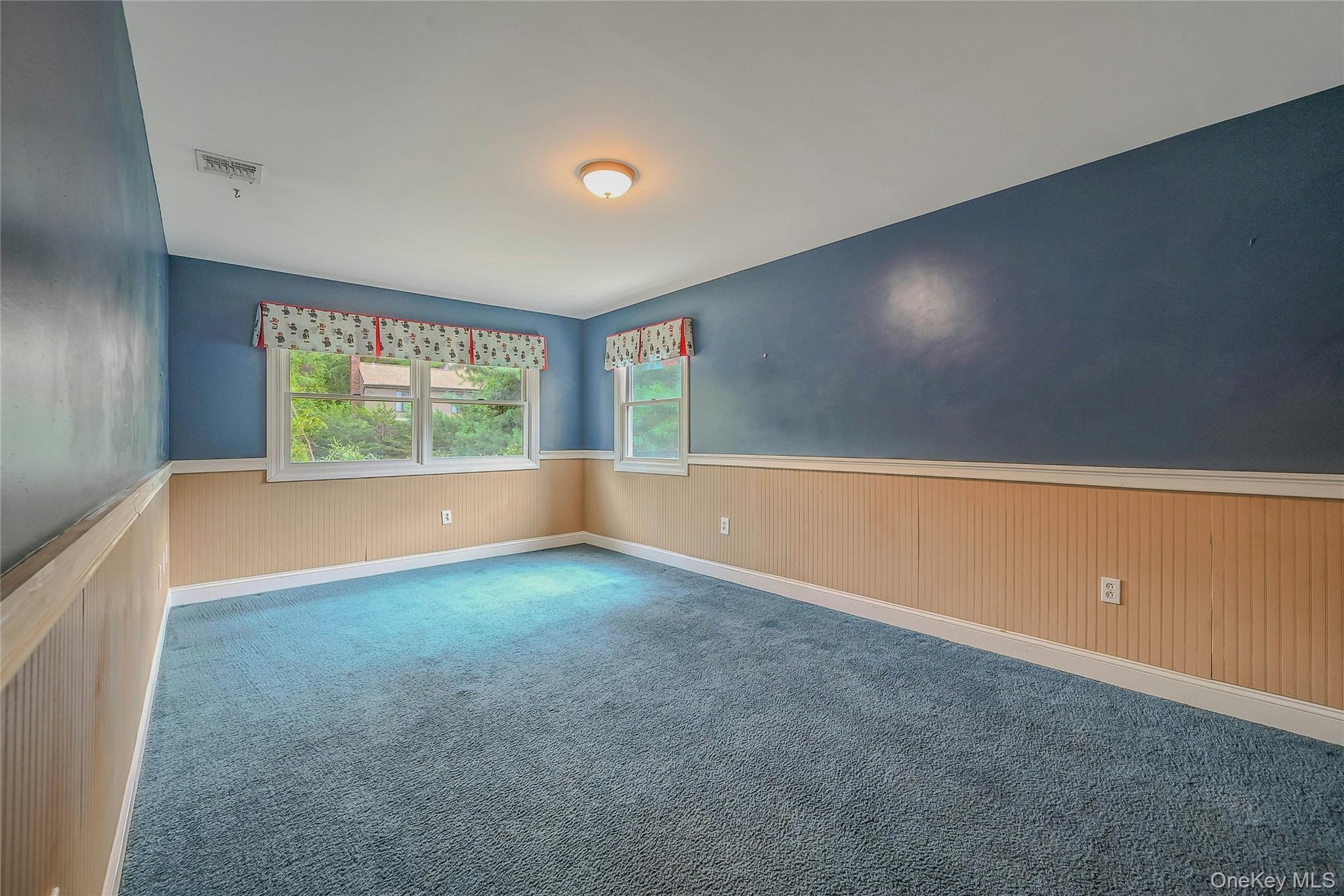4 Skunk Hollow Road Huntington, NY 11743 - Photo 24 of 35 an empty room with windows