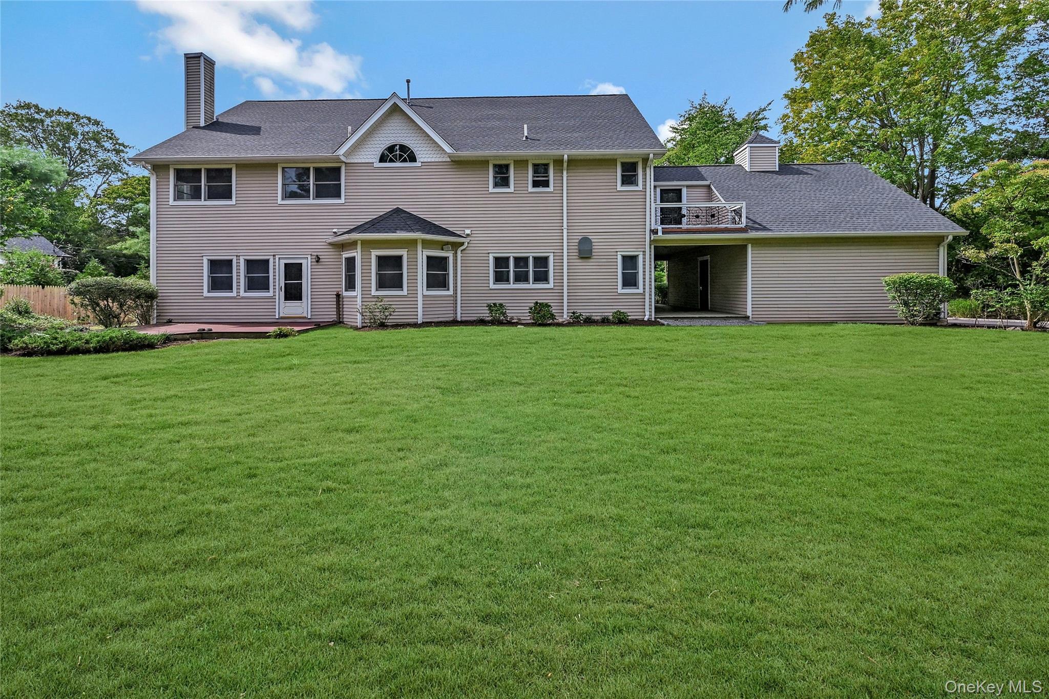 4 Skunk Hollow Road Huntington, NY 11743 - Photo 29 of 35 a aerial view of a house yard