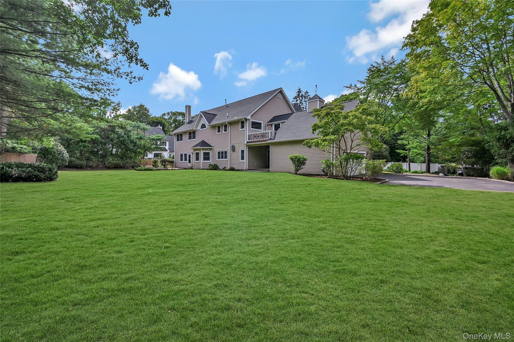4 Skunk Hollow Road Huntington, NY 11743 - Photo 30 of 35 a house view with a garden space