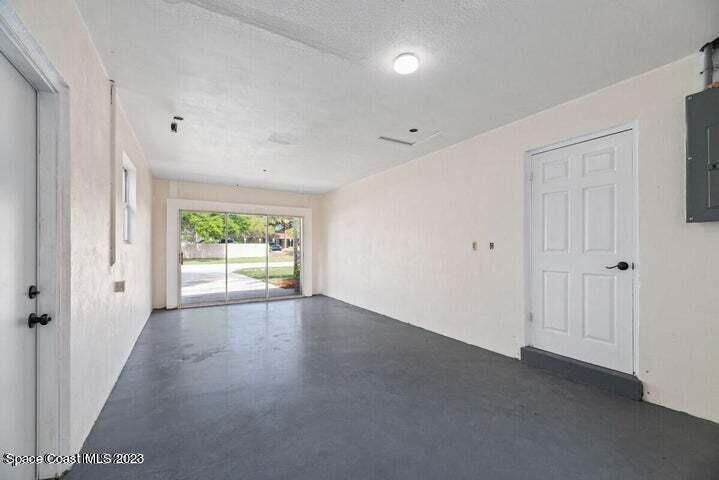 15 Devonshire Drive Melbourne, FL 32901 - Photo 5 of 5 a view of an empty room with a window