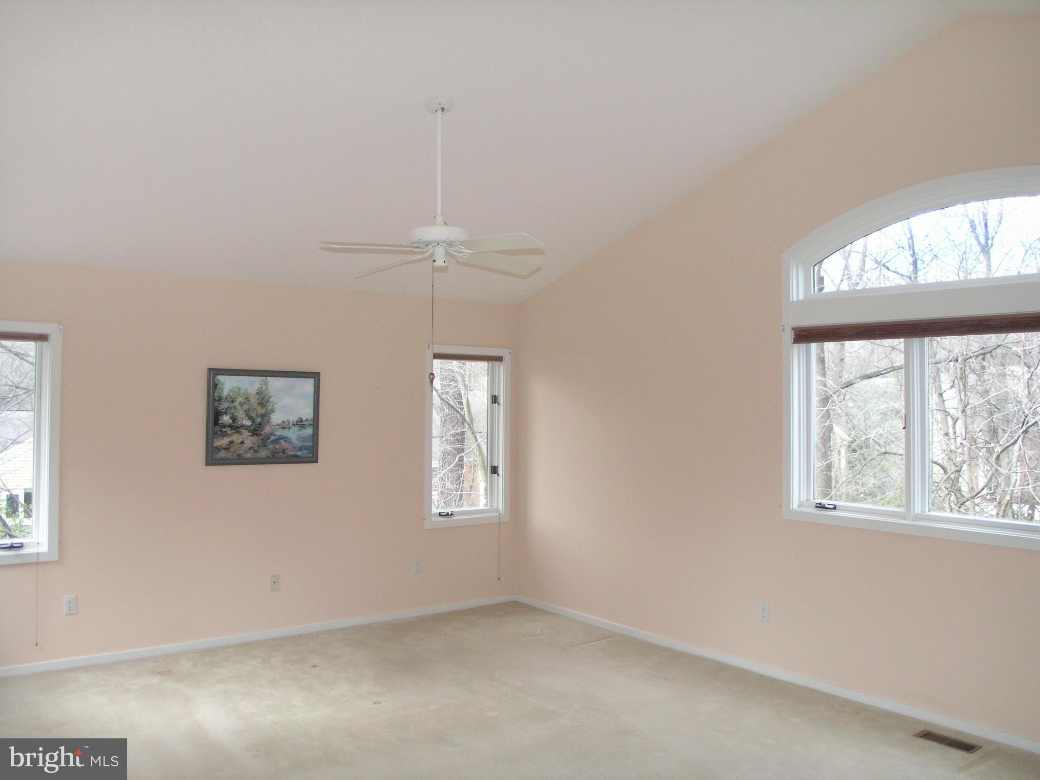 11555 Hemingway Drive Reston, VA 20194 - Photo 16 of 26 a view of room with window and ceiling fan