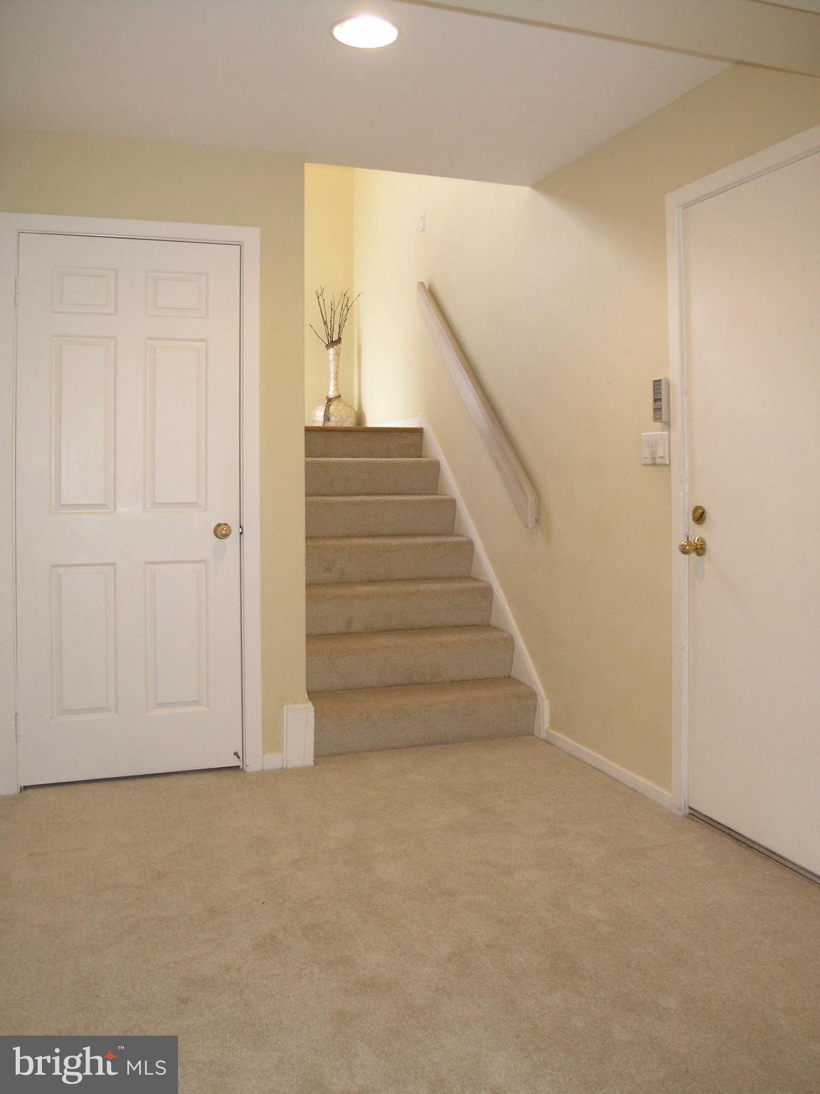 11555 Hemingway Drive Reston, VA 20194 - Photo 21 of 26 a view of entryway with wooden floor