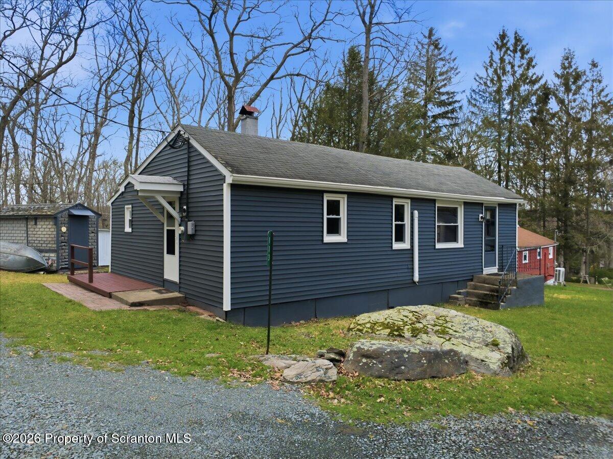 113 Stoney Hill Road Dingmans Ferry, PA 18328 - Photo 3 of 65 a view of a house with a yard
