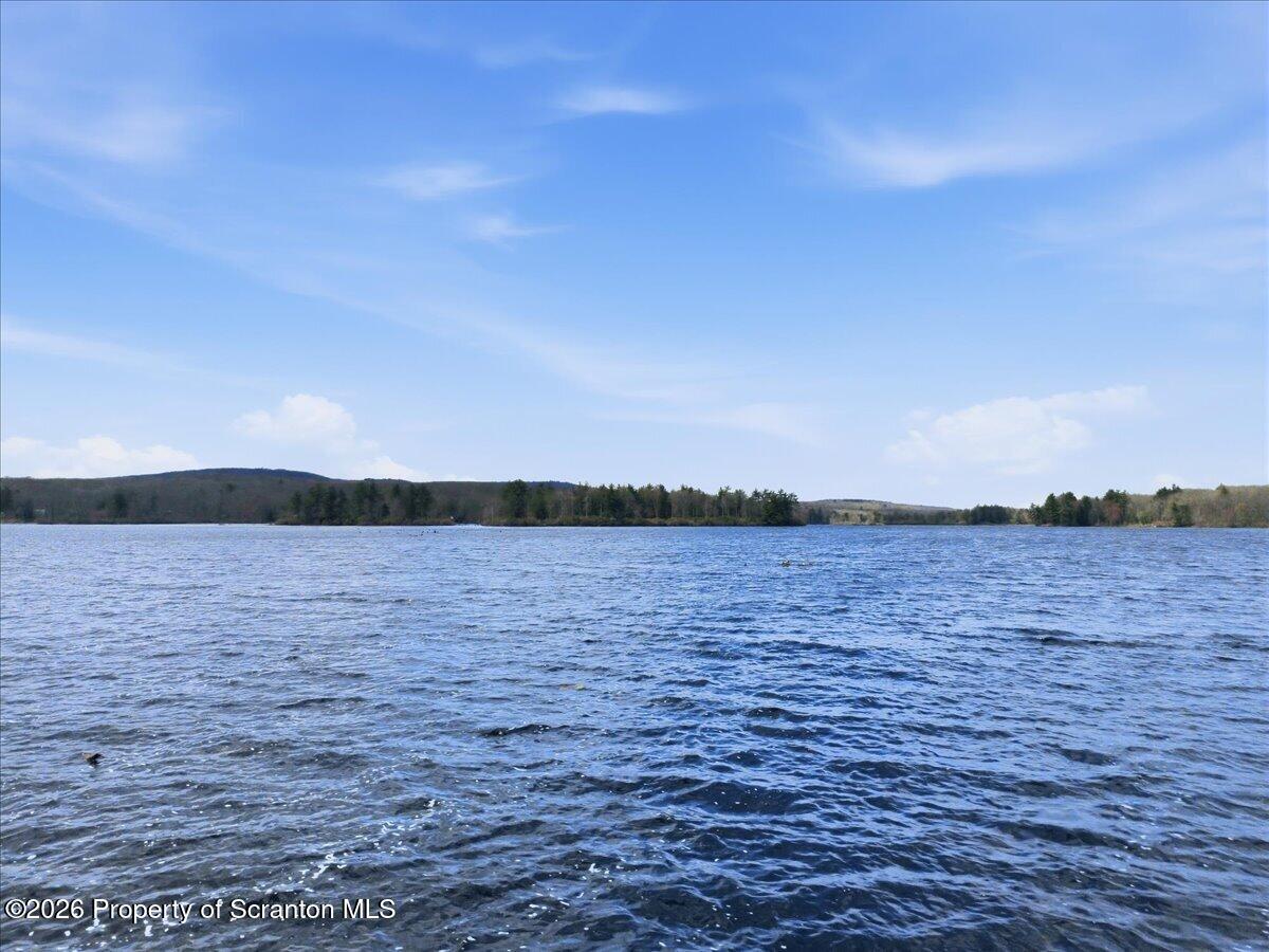 113 Stoney Hill Road Dingmans Ferry, PA 18328 - Photo 55 of 65 a view of lake and sunset