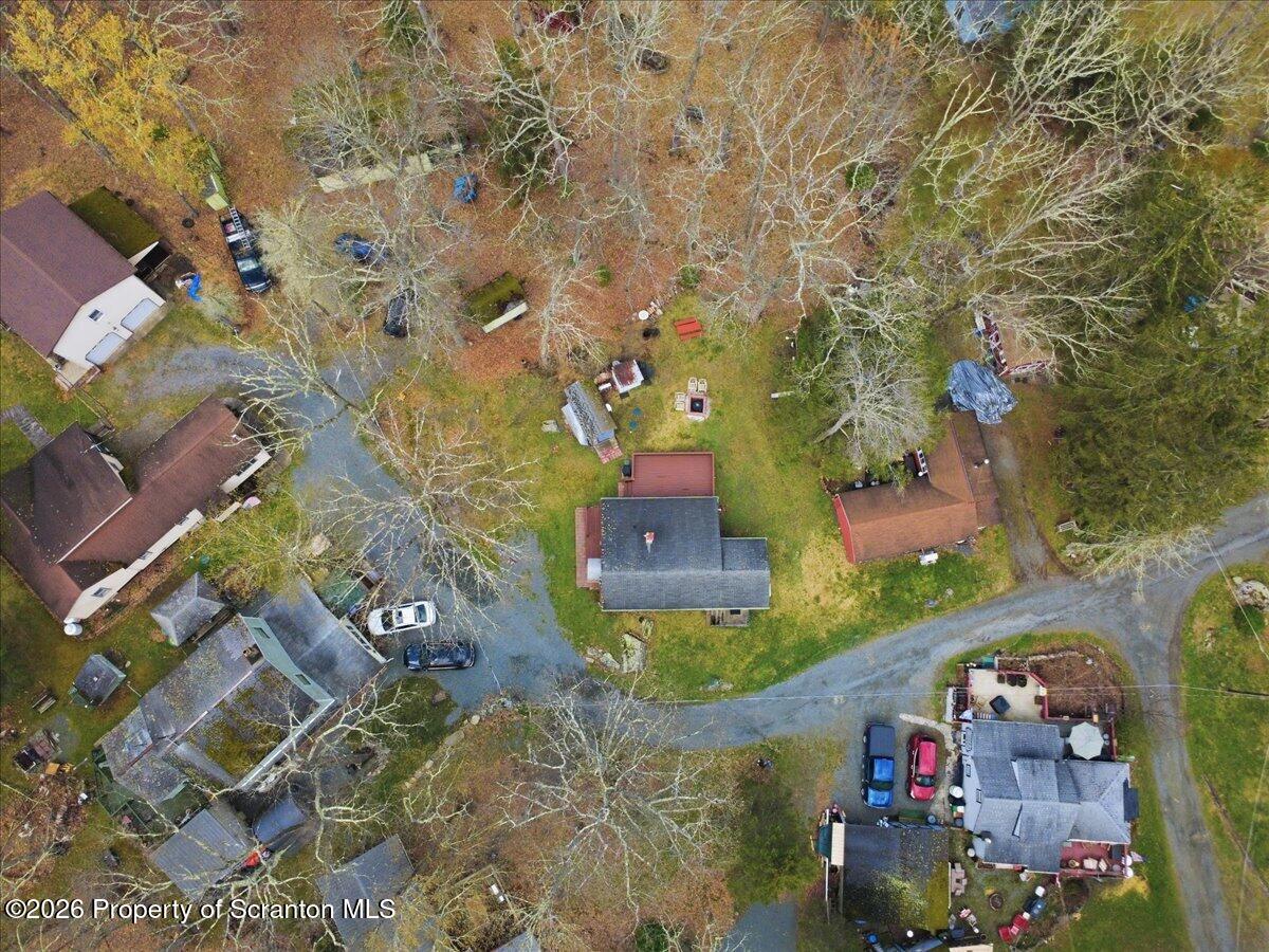 113 Stoney Hill Road Dingmans Ferry, PA 18328 - Photo 59 of 65 an aerial view of residential houses with outdoor space