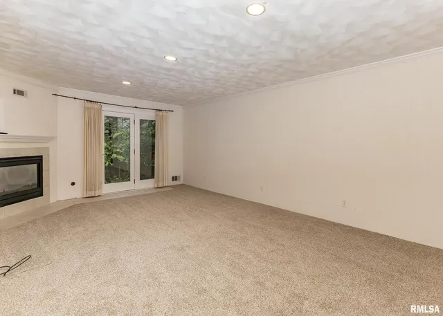 an empty room with windows