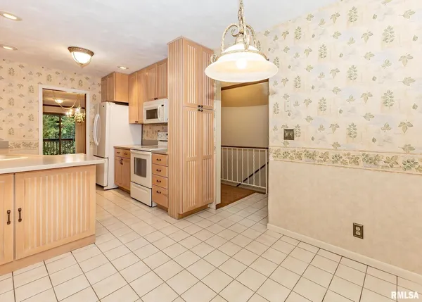 a view of a kitchen with kitchen