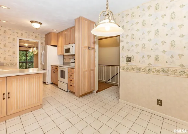 a view of a kitchen with kitchen