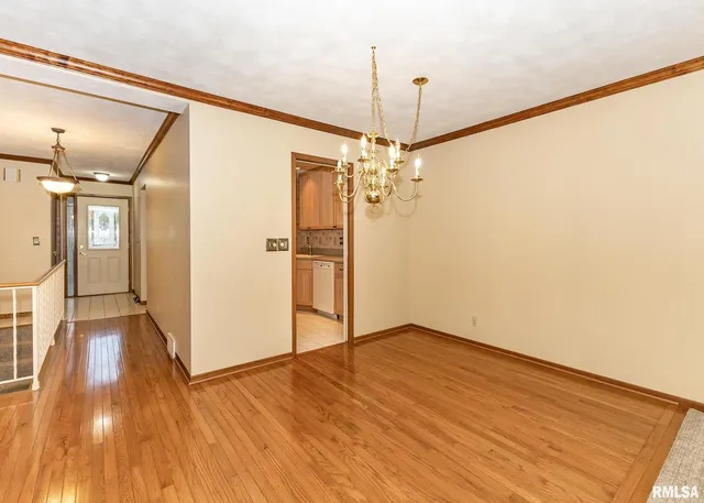 a view of a livingroom with wooden floor