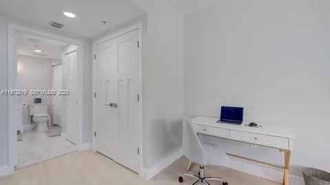 a room with a bench and a sink