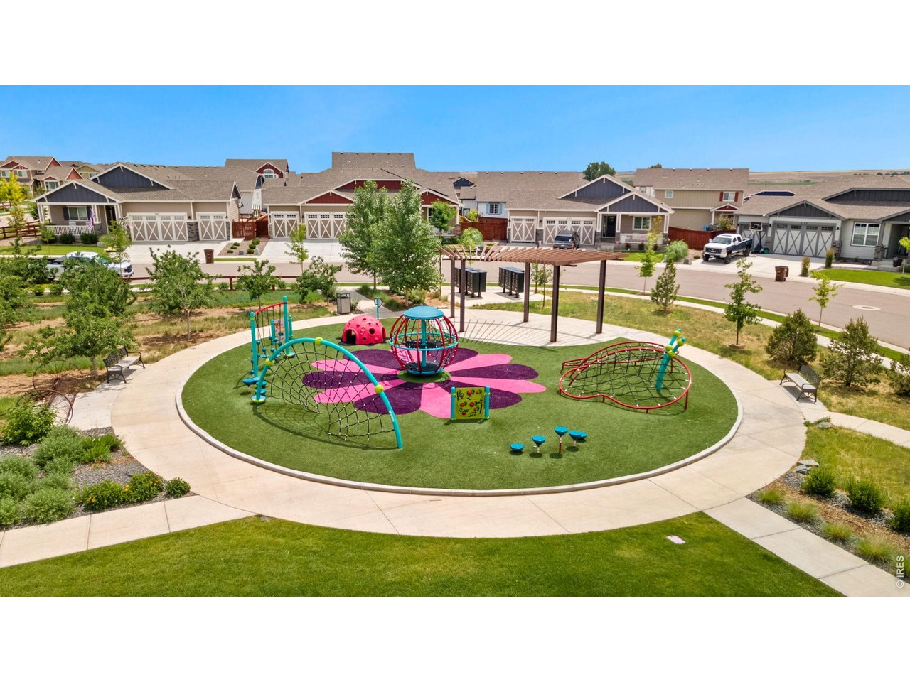 1484 First Light Drive Windsor, CO 80550 - Photo 21 of 23 a view of a swimming pool with a lot of buildings