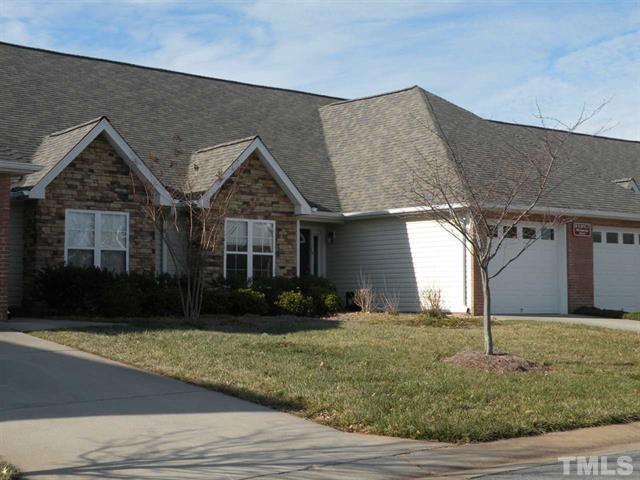 11391 Involute Place, Unit 101 Raleigh, NC 27617 - Photo 1 of 2 a front view of a house with garden