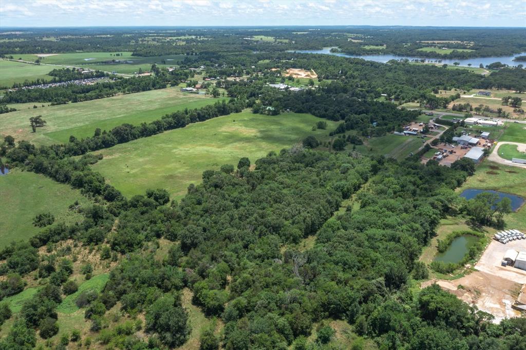 64 State Highway 64 Canton, TX 75103 - Photo 9 of 25 an aerial view of residential houses with outdoor space and trees