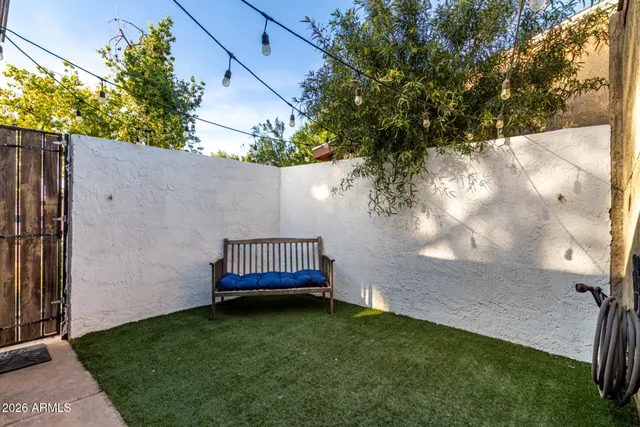a view of a swimming pool with a lounge chairs