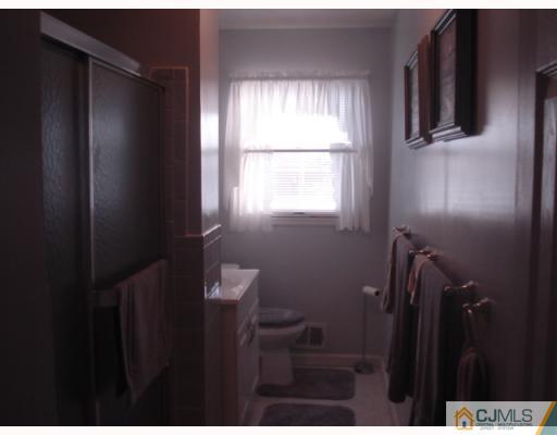 17 Lehigh Road Old Bridge, NJ 08859 - Photo 6 of 10 a bathroom with a window
