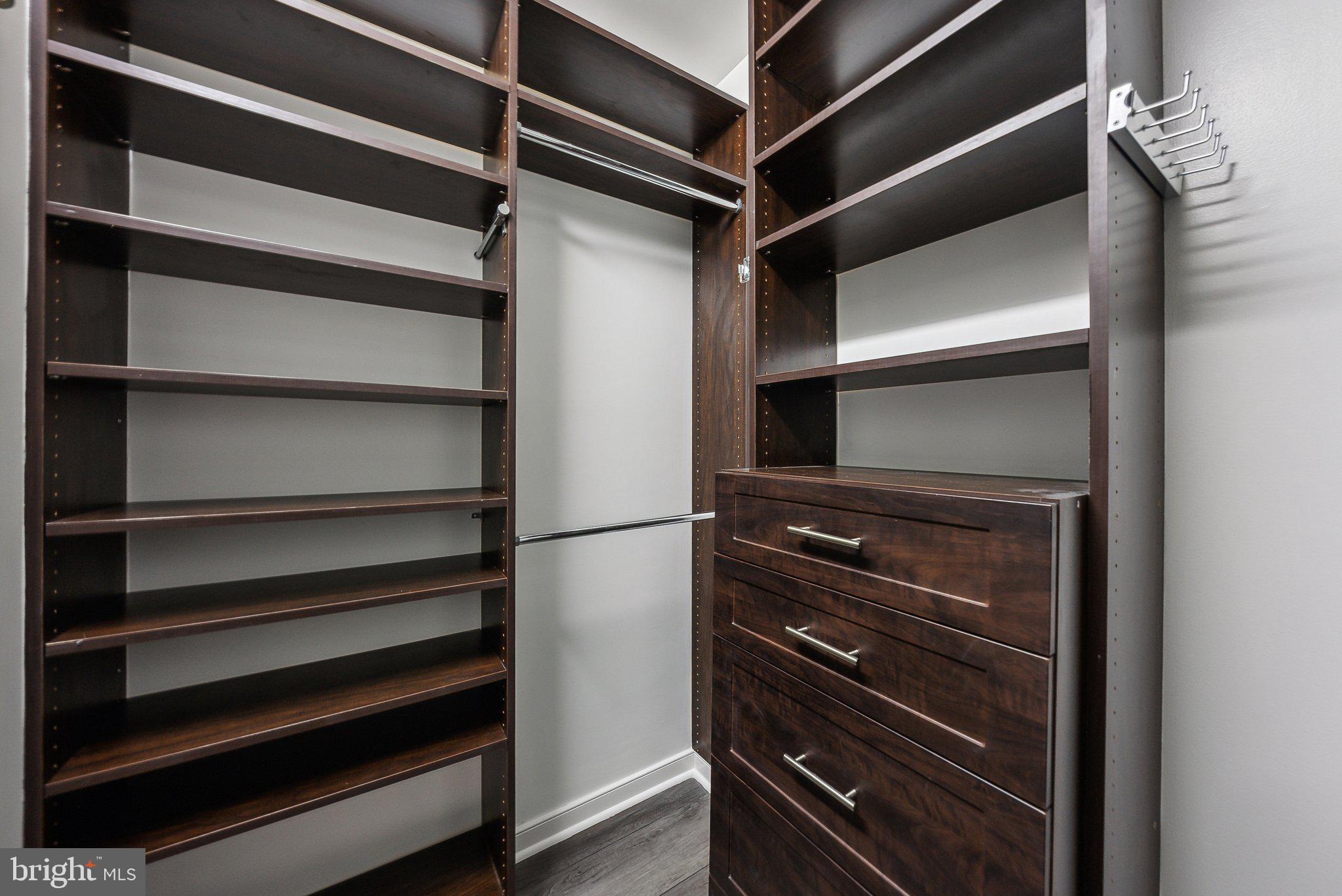 851 North Glebe Road, Unit 2008 Arlington, VA 22203 - Photo 21 of 37 Sleek, modern closet with ample storage.