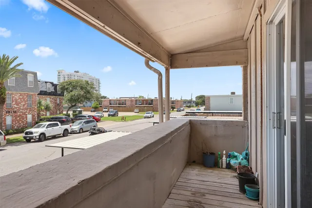 a view of a balcony with city view
