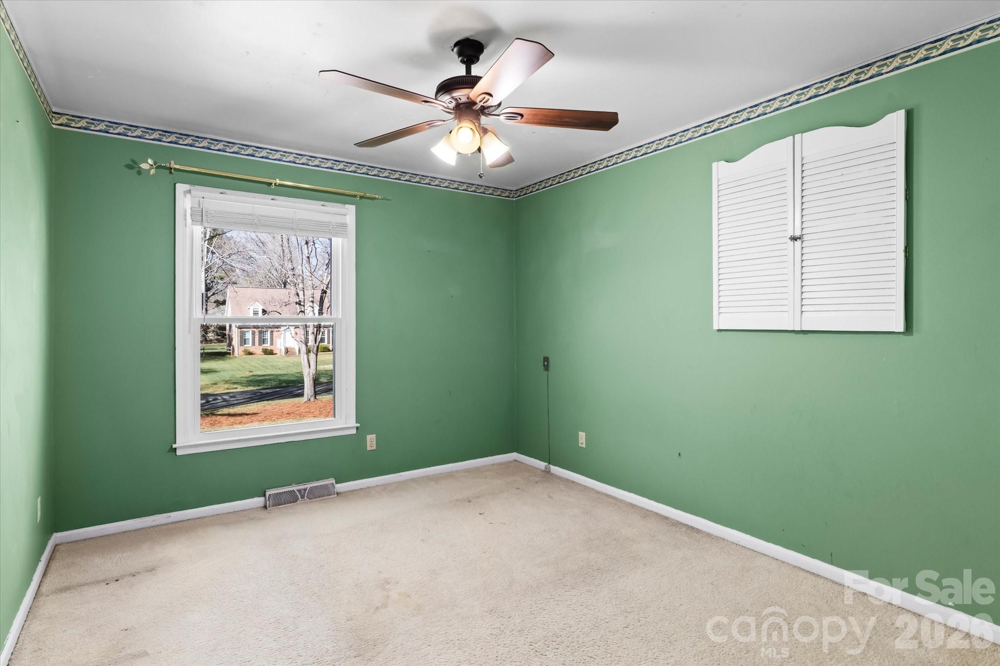 3000 Windrow Lane Matthews, NC 28105 - Photo 18 of 20 a view of a bedroom with window