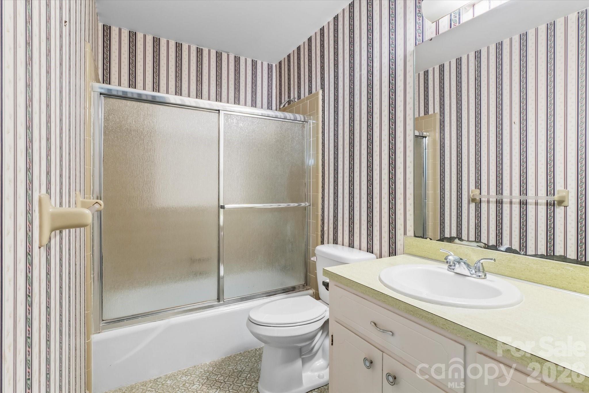 3000 Windrow Lane Matthews, NC 28105 - Photo 20 of 20 a bathroom with a sink toilet and shower