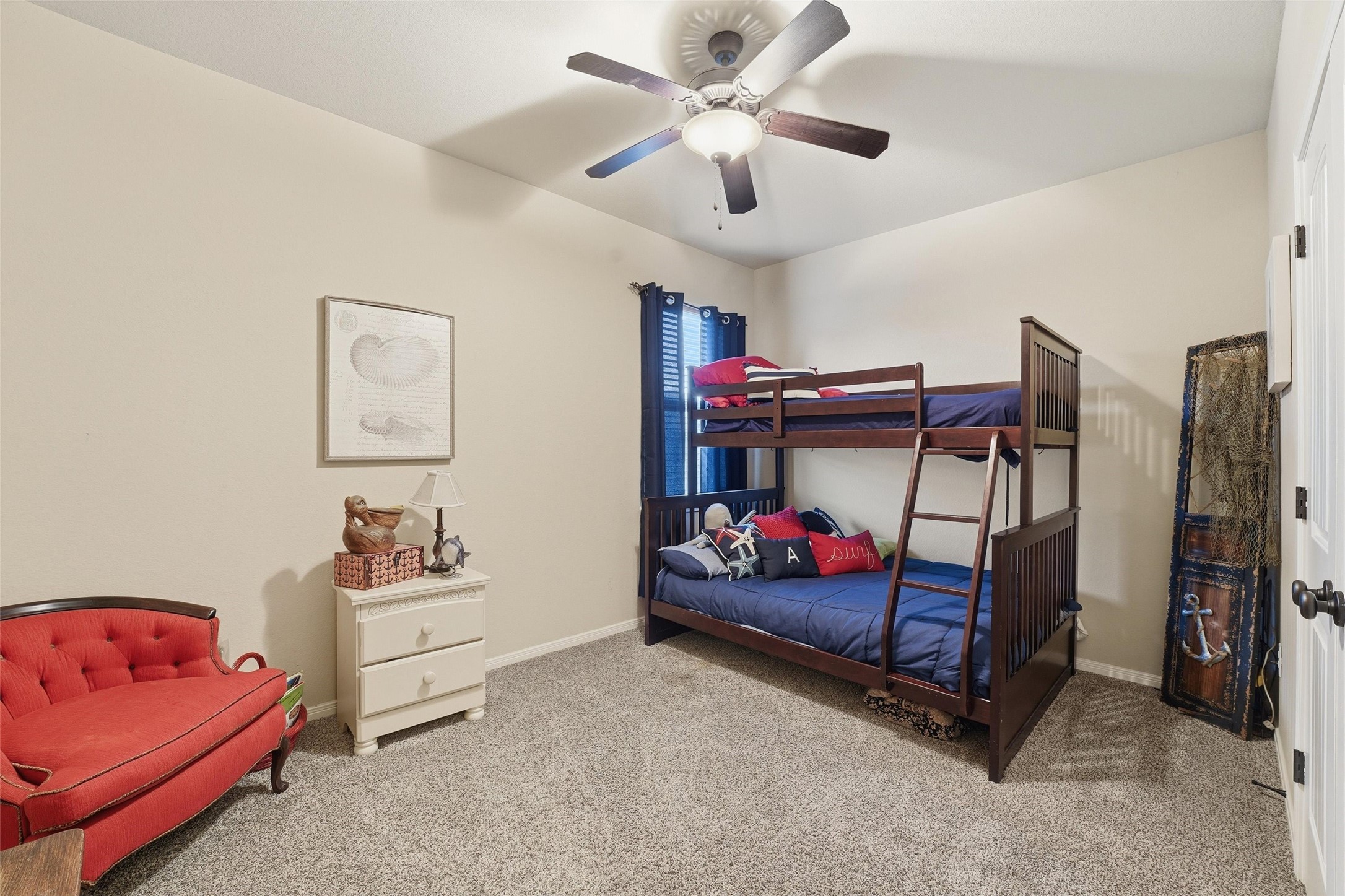 18115 Oliveria Way Houston, TX 77044 - Photo 21 of 32 a living room with furniture and a bed