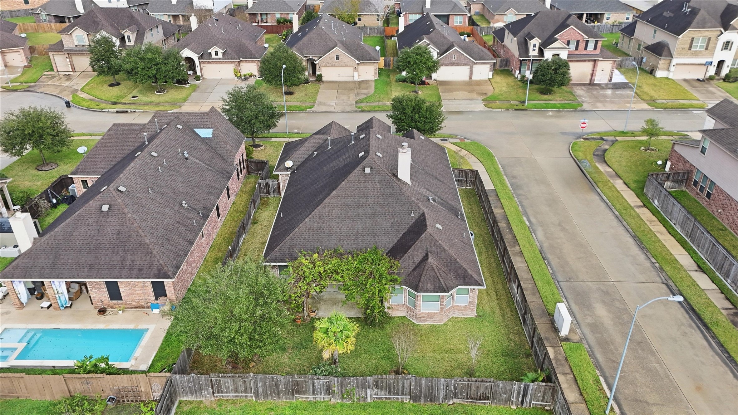 18115 Oliveria Way Houston, TX 77044 - Photo 27 of 32 an aerial view of a house with a swimming pool
