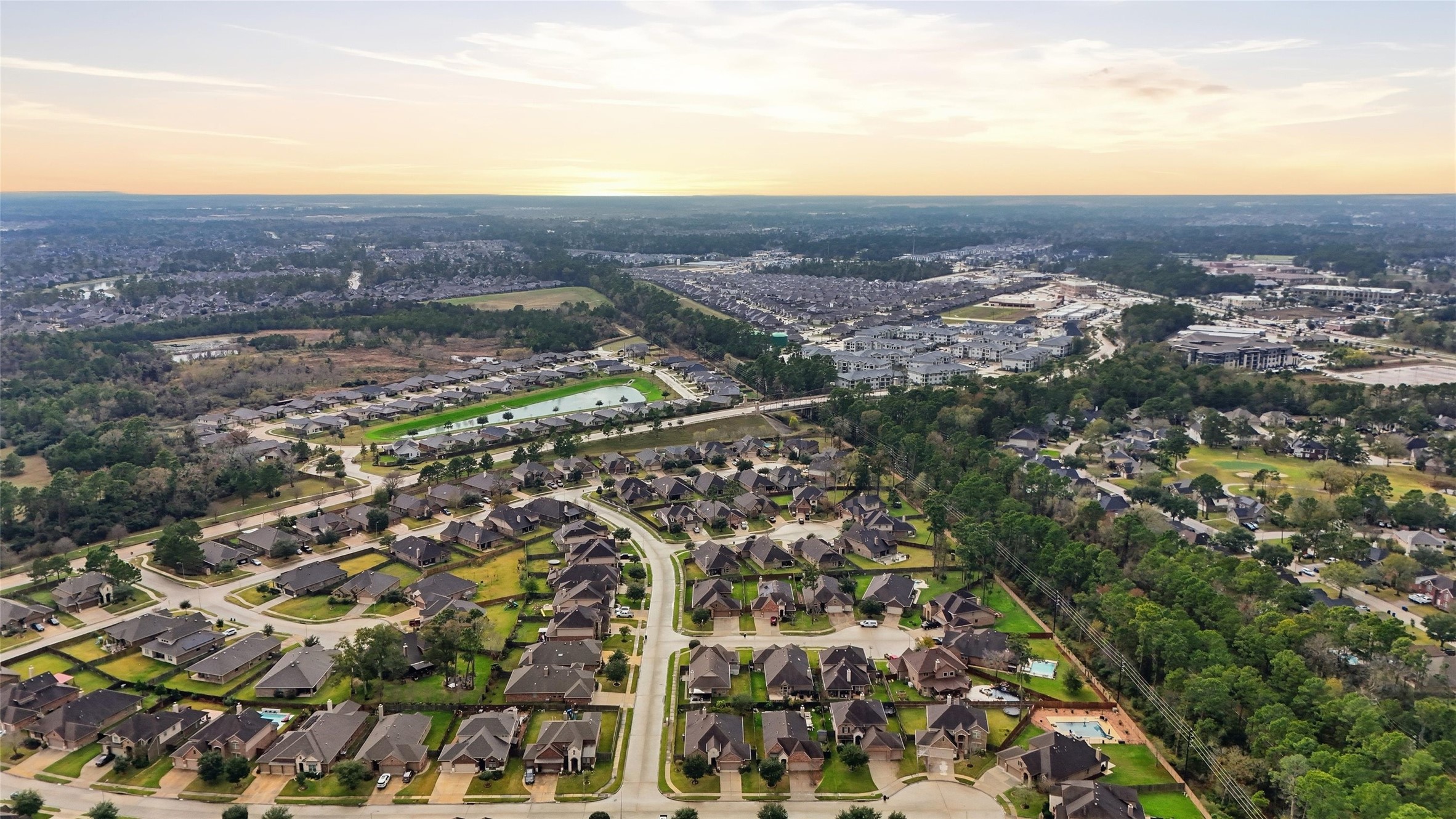 18115 Oliveria Way Houston, TX 77044 - Photo 31 of 32 an aerial view of residential building and green space