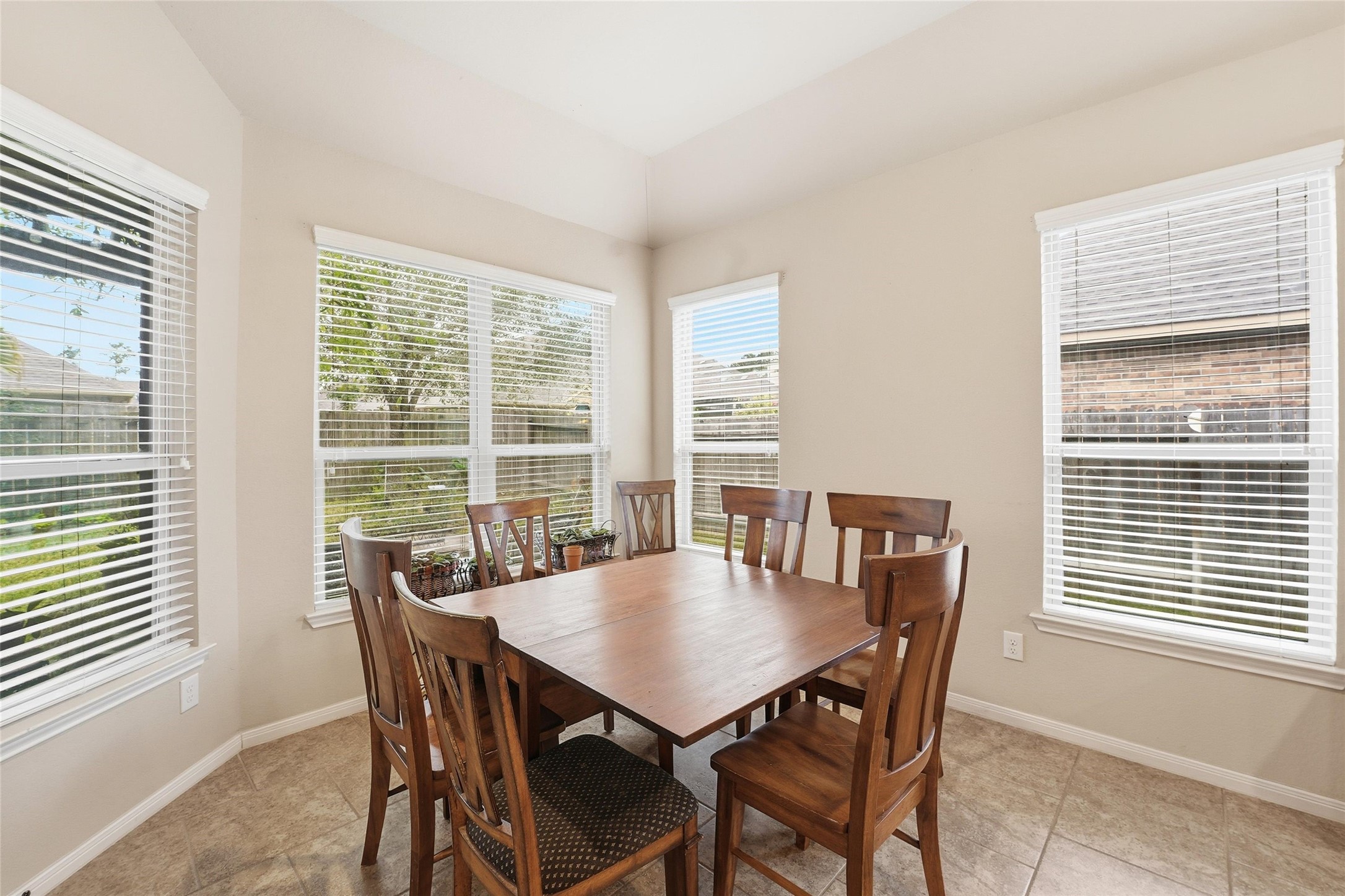 18115 Oliveria Way Houston, TX 77044 - Photo 8 of 32 a view of a dining room with furniture and window