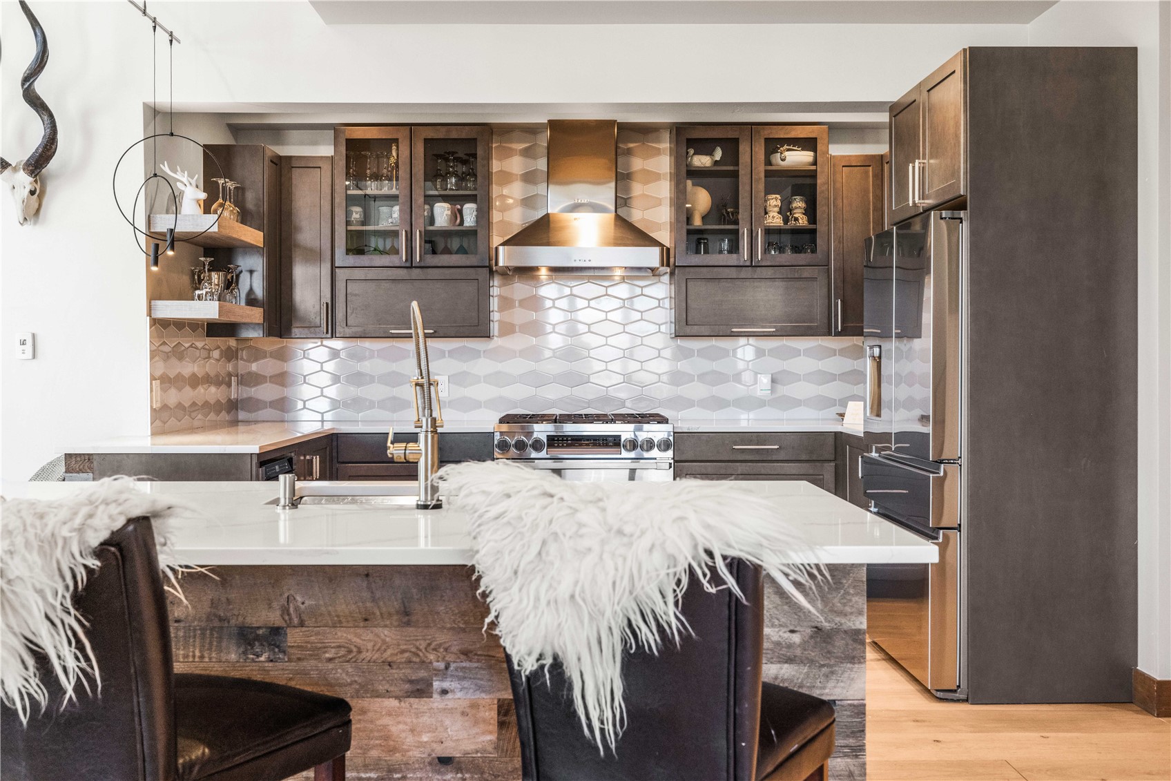 230 Game Trail Road Silverthorne, CO 80498 - Photo 13 of 43 a kitchen with a table and chairs