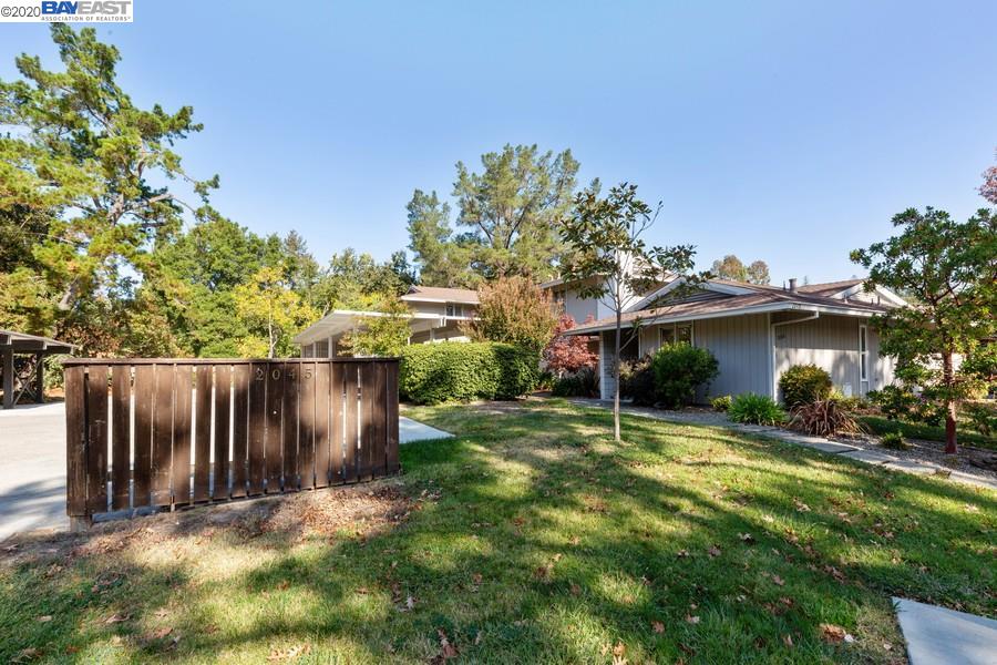 2045 Camel Lane, Unit 4 Walnut Creek, CA 94596 - Photo 1 of 9 a view of a house with backyard and sitting area