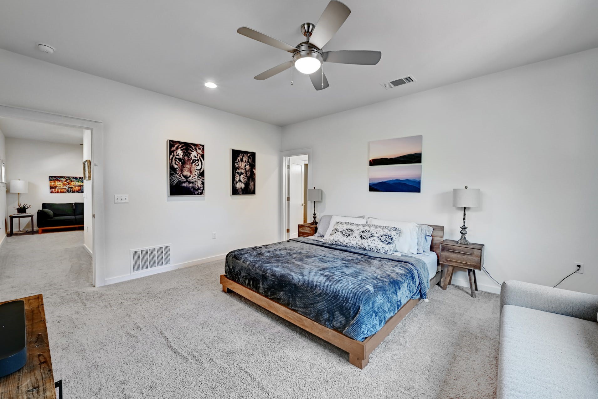 6800 Menchaca Road, Unit 24 Austin, TX 78745 - Photo 11 of 22 a bedroom with a bed and ceiling fan