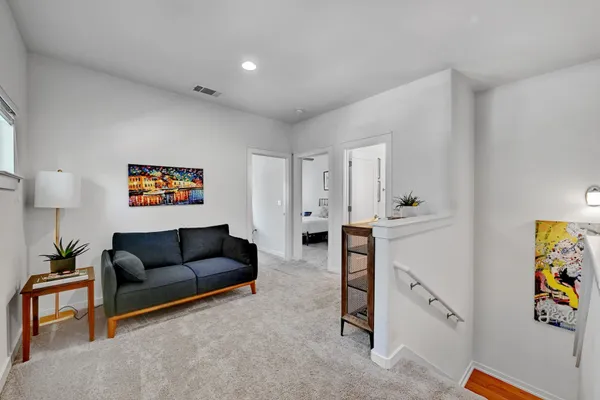 a living room with furniture and a couch