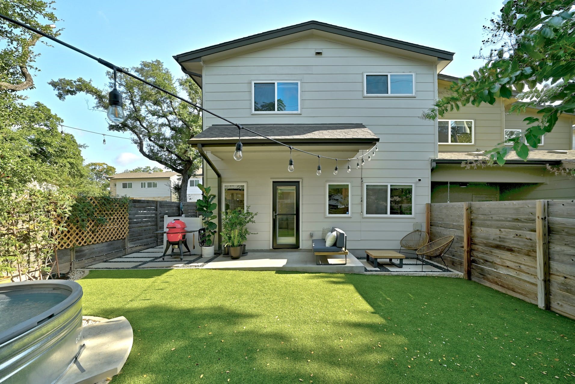 6800 Menchaca Road, Unit 24 Austin, TX 78745 - Photo 18 of 22 a view of a house with patio