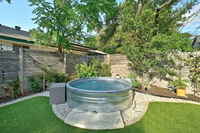 a view of a porch with a fountain and a fountain