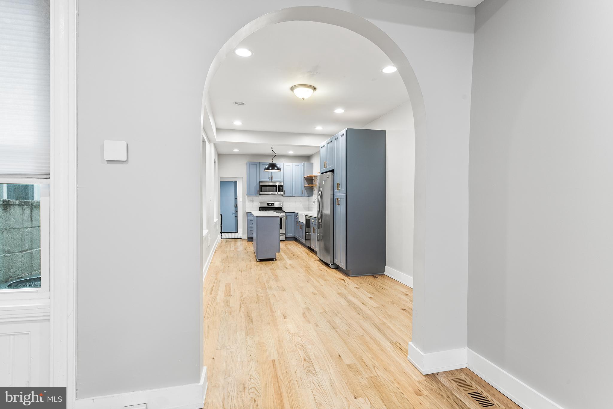 2340 West Thompson Street Philadelphia, PA 19121 - Photo 7 of 36 Arched wall to kitchen