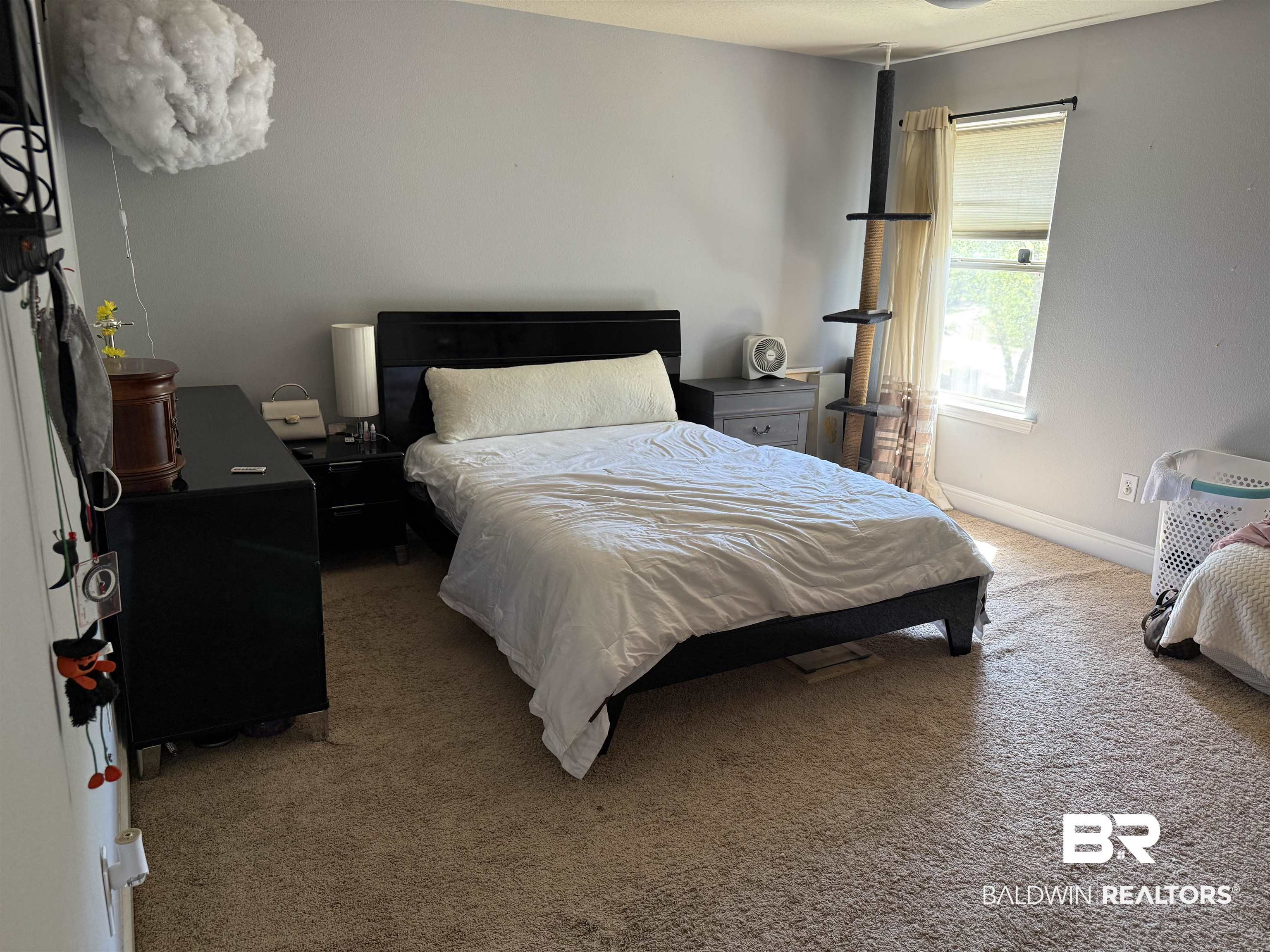 9023 Krystal Ridge Court Daphne, AL 36526 - Photo 23 of 41 Bedroom featuring light carpet and baseboards