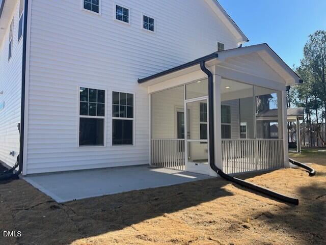 703 Chopper Lane, Unit 12 Durham, NC 27703 - Photo 3 of 4 a front view of a house with a garage