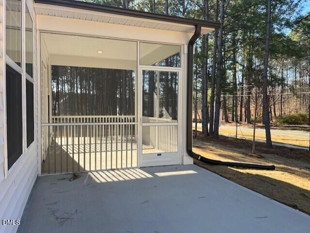 703 Chopper Lane, Unit 12 Durham, NC 27703 - Photo 4 of 4 a view of a house with a outdoor space
