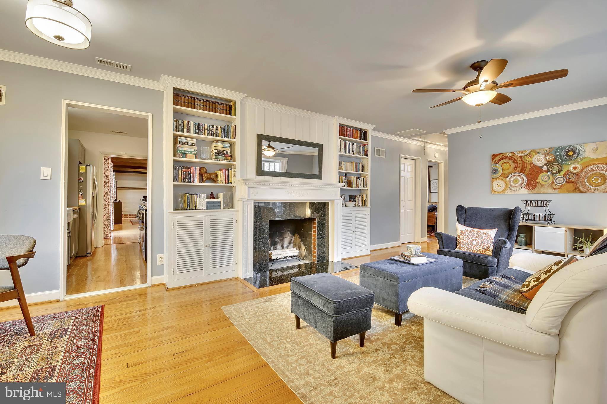 2511 Plyers Mill Road Silver Spring, MD 20902 - Photo 4 of 26 Wood Burning Fireplace and Built In Bookshelves