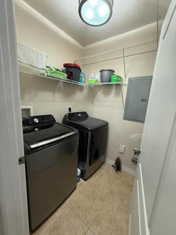 a room with wooden floor and furniture