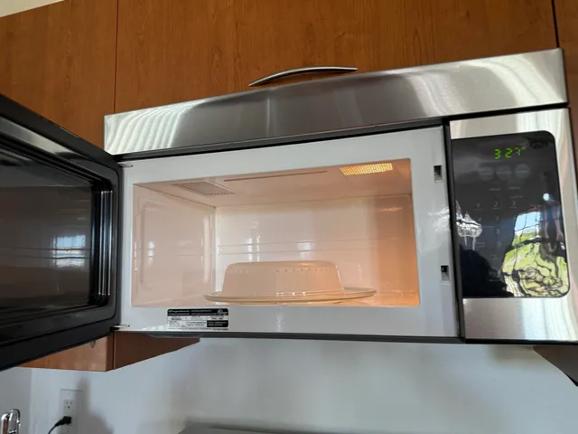 a view of staircase with wooden floor